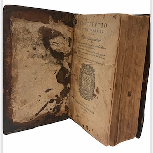 1576.  Extremely Rare First Edition of Calvin published in England