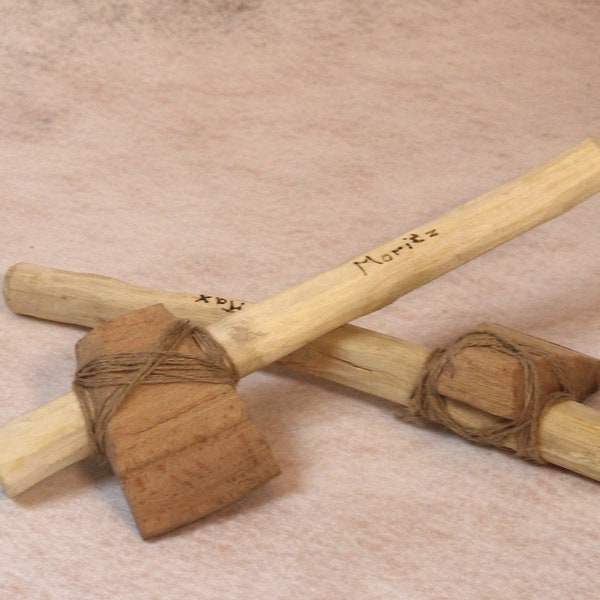 Handcrafted wooden ax made from grown wood