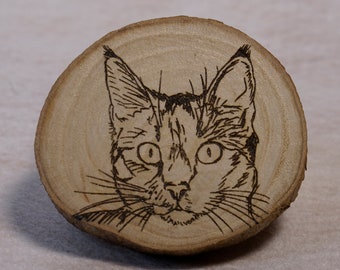 Handmade wooden animal image from a tree disc