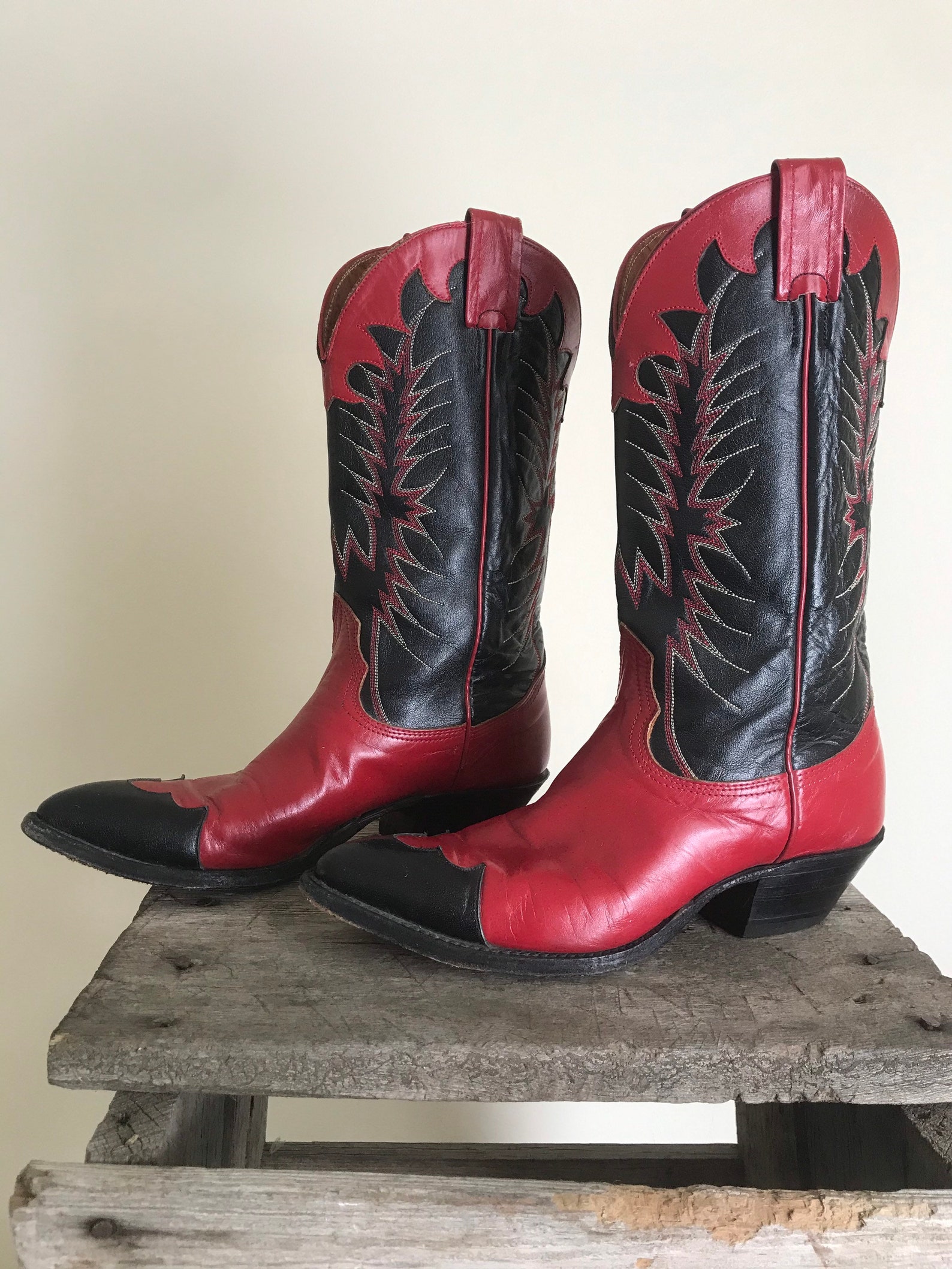 black and red wingtip shoes