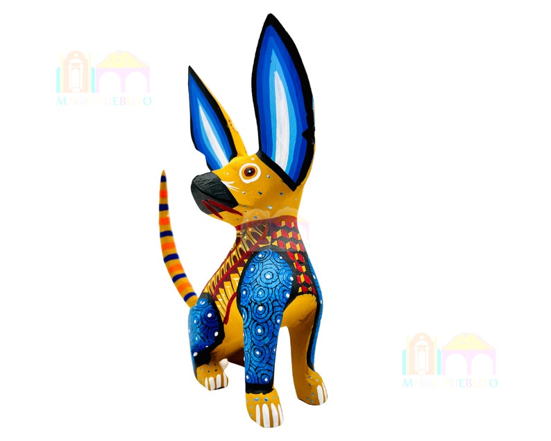 May include: A hand-painted wooden dog sculpture with blue, yellow, red, and black details. The dog has large ears and a long tail.
