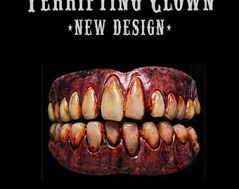 May include: A set of prosthetic teeth featuring a dark red, textured gum line and stained, yellowed, uneven teeth. The text TERRIFYING CLOWN NEW DESIGN is printed in white above the dental appliance against a solid black background.