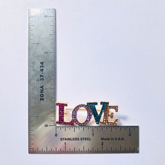 Love brooch discount