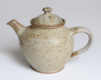 Small brown salt-glazed teapot