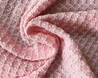 Unique vintage style knitted crochet textured fabric in light pink. Made in Nottingham.