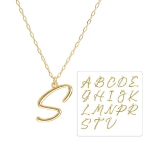 May include: Gold necklace with a cursive letter 'S' pendant. The pendant is attached to a delicate chain. The image also shows a chart of other cursive letters available as pendants.