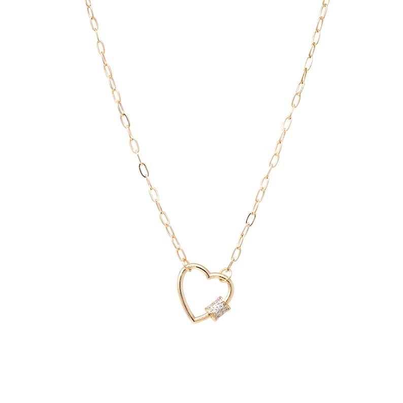 May include: A gold chain necklace with a heart-shaped pendant featuring a small, clear gemstone.
