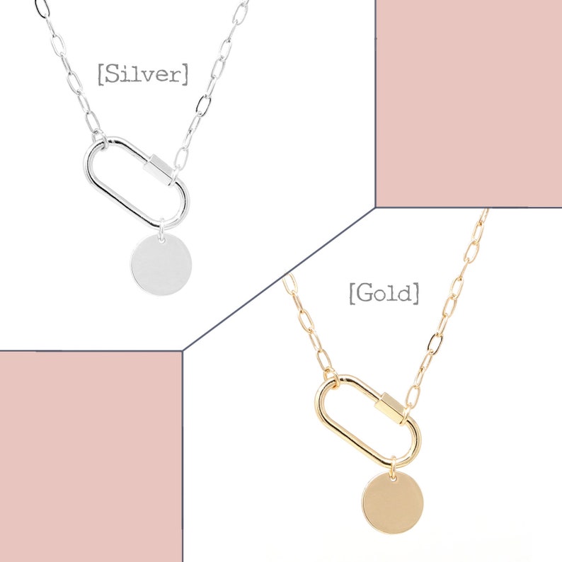 May include: Two silver and gold necklaces with a carabiner clasp and a round pendant. The silver necklace has the text [Silver] and the gold necklace has the text [Gold].