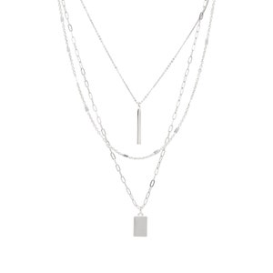 May include: A silver layered necklace with two pendants. The top pendant is a long, thin rectangle. The bottom pendant is a square.