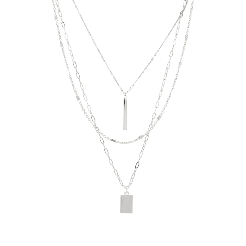 May include: A silver layered necklace with two pendants. The top pendant is a long, thin rectangle. The bottom pendant is a square.