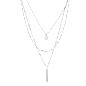 A set of 3 layered necklace in silver with a small disc and a skinny bar charms.