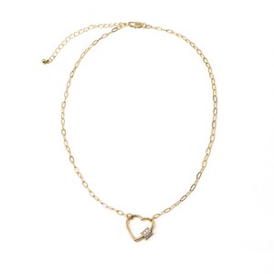 May include: A gold chain necklace with a heart-shaped pendant featuring a small clear crystal.