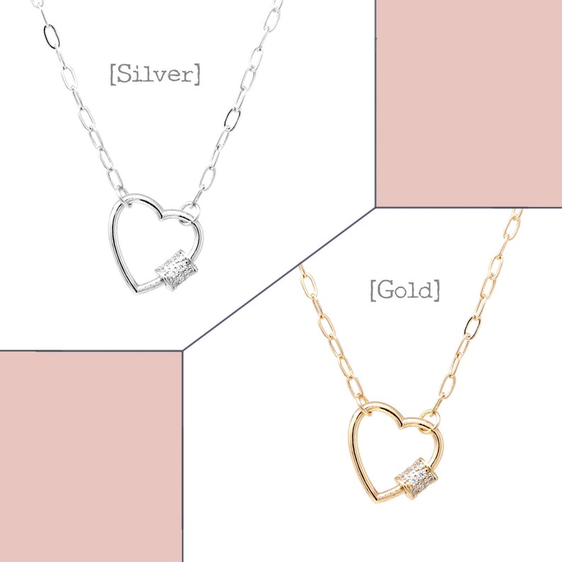 May include: Two silver and gold necklaces with heart-shaped pendants. The pendants have a small diamond-like stone in the center. The necklaces are labeled [Silver] and [Gold].