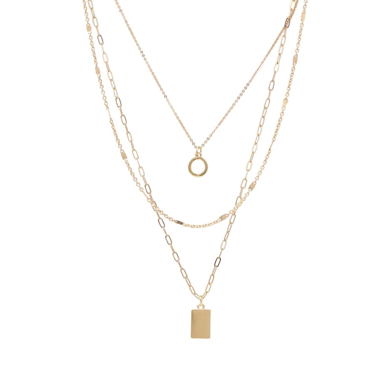 May include: A gold layered necklace with a circle pendant and a rectangular pendant.