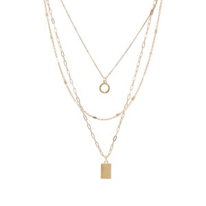 Gold 3 tier bar charm necklace set with circle and rectangle pendants on layered paperclip chains.