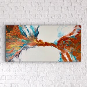May include: Abstract painting with swirling colours of blue, orange, and gold. The colours are mixed together in a dynamic and energetic way, creating a sense of movement and energy. The painting is on a white canvas.