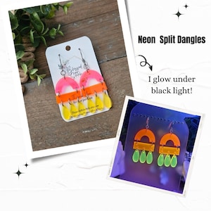 May include: Neon split dangle earrings in pink, orange, and yellow. The earrings have a layered design with a curved top and teardrop-shaped dangles. The text on the card says "Thank you for your purchase". The earrings glow under black light.