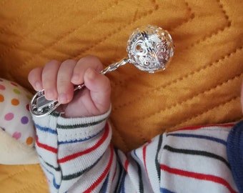 Baby's first silver rattle. Magic sound baby toy. Personalised newborn rattle gift idea. Chirstening baby keepsake. Custom engraved baby toy