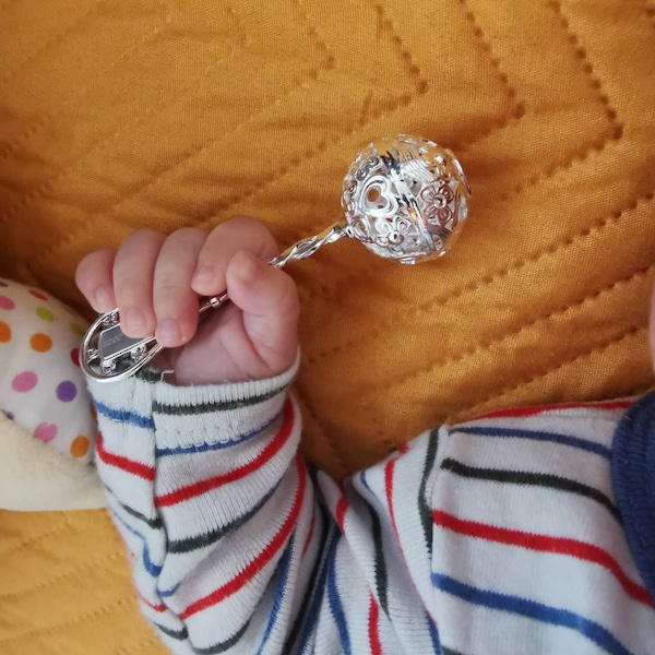 Baby's first silver rattle. Magic sound baby toy. Personalised newborn rattle gift idea. Chirstening baby keepsake. Custom engraved baby toy