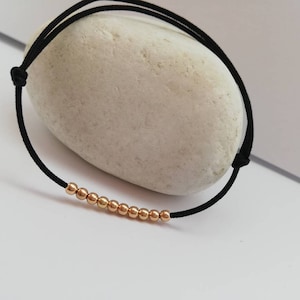14k solid yellow gold tiny beads bracelet for women. Black string bracelet. AU 585 14k gold string bracelet. Birthday Gold Jewelry for girl