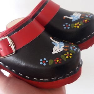 Children painted clogs