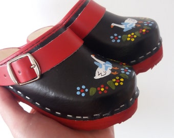 Children painted clogs