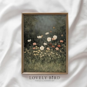 Könnte beinhalten: Ein gerahmter Vintage-Kunstdruck mit einem Feld aus Wildblumen in Weiß, Rosa und Gelb. Das Kunstwerk hat einen dunklen, stimmungsvollen Hintergrund mit Schmetterlingen und ist in einem goldfarbenen Rahmen gerahmt. Der Text "LOVELY BIRD VINTAGE & MODERN ART" steht unten.