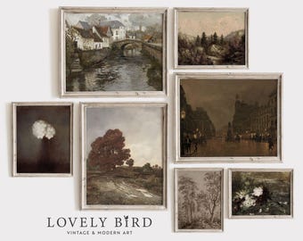 May include: A collection of seven framed vintage landscape paintings. The artwork features scenes of rivers, trees, and cityscapes in muted tones. The paintings are displayed against a white background. The Lovely Bird logo is at the bottom.