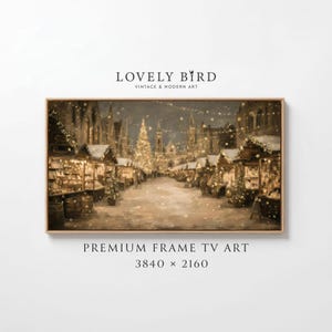 May include: A framed print of a winter scene with a Christmas market. The artwork depicts a snowy street lined with stalls and illuminated by warm lights. The text "LOVELY BIRD VINTAGE & MODERN ART" and "PREMIUM FRAME TV ART 3840 x 2160" are visible.