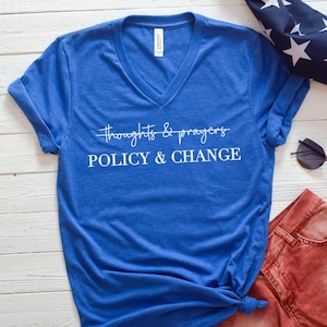 May include: A rustic wooden sign with the text "Welcome to our home" in white lettering. The sign features a distressed finish and a simple, inviting design, perfect for entryway decor.