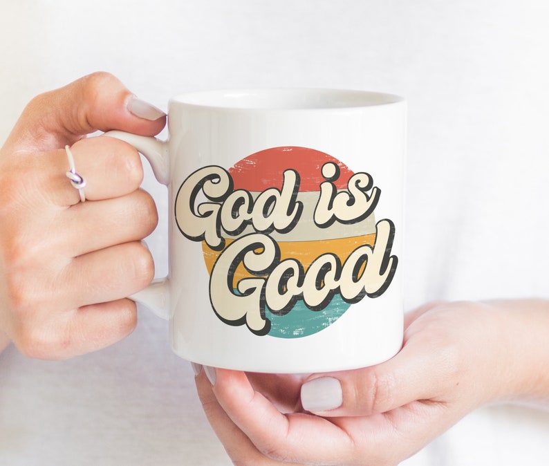 May include: White ceramic mug with a red, orange, yellow, and blue retro-style graphic that says "God is Good".