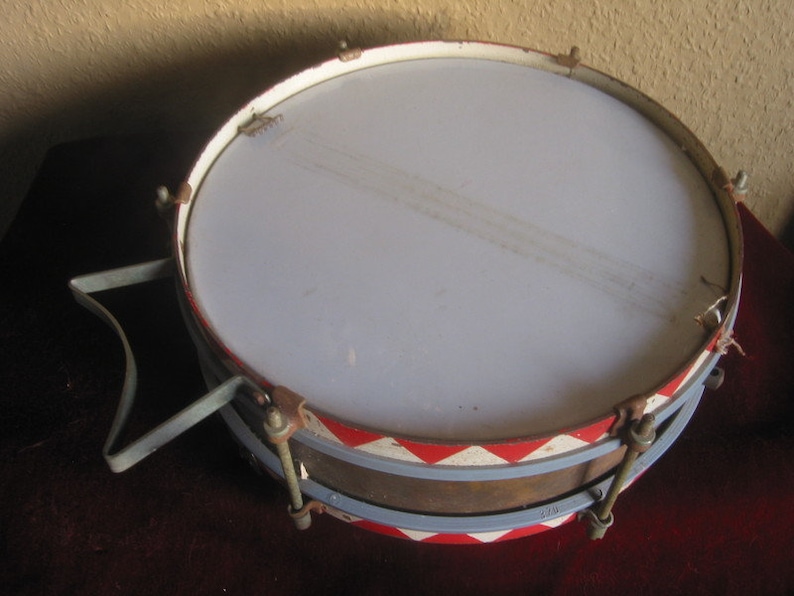vintage boudoir Christmas decorations marching drum old musical instrument Old tin drum