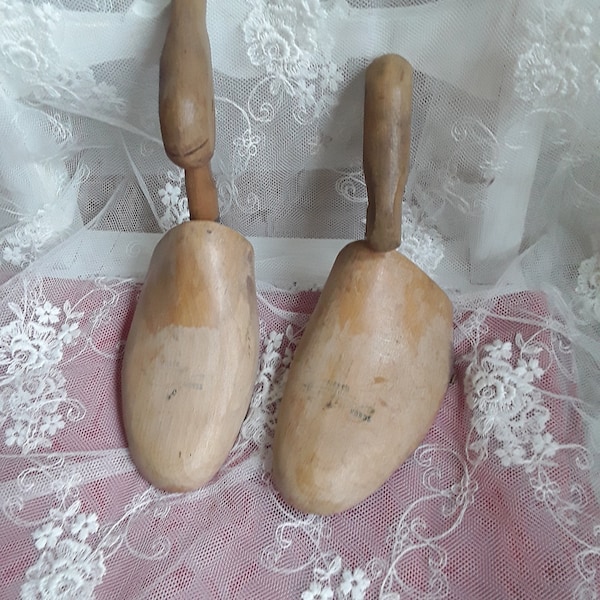 Pair of old shoe lasts shoe trees folding shoe lasts made of wood turned handles prop vintage boudoir brocante decoration antique