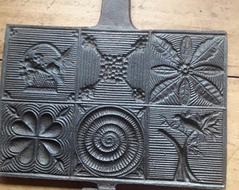 Antiek gietijzeren wafelijzer, hostieijzer, kaneelwafelijzer met vogel- en vismotieven, 19e-eeuwse boerderijdecoratie, vintage brocante, landhuis