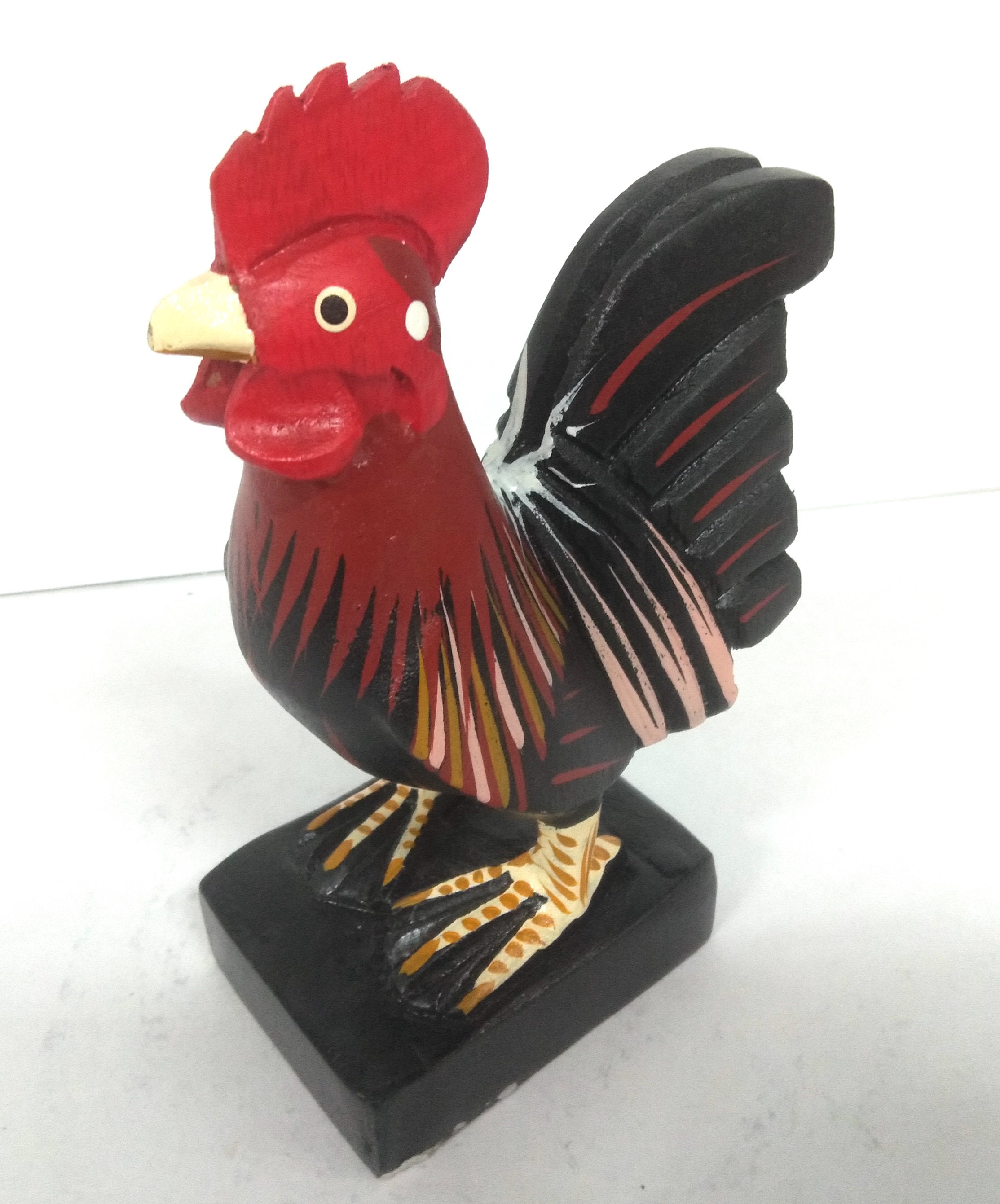 Hand carved wooden roosters