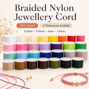 May include: Braided nylon jewellery cord on multiple spools in 38 colours and 4 thicknesses of 0.3mm, 0.6mm, 1mm, and 1.5mm. The image displays rows of colourful thread spools and a pink braided bracelet with a gold bead, featuring the text Braided Nylon Jewellery Cord.