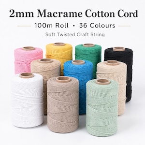 May include: A collection of 2mm macrame cotton cord rolls in various colors including white, pink, yellow, green, black, blue, and beige. The text reads 2mm Macrame Cotton Cord, 100m Roll, 36 Colours, and Soft Twisted Craft String.