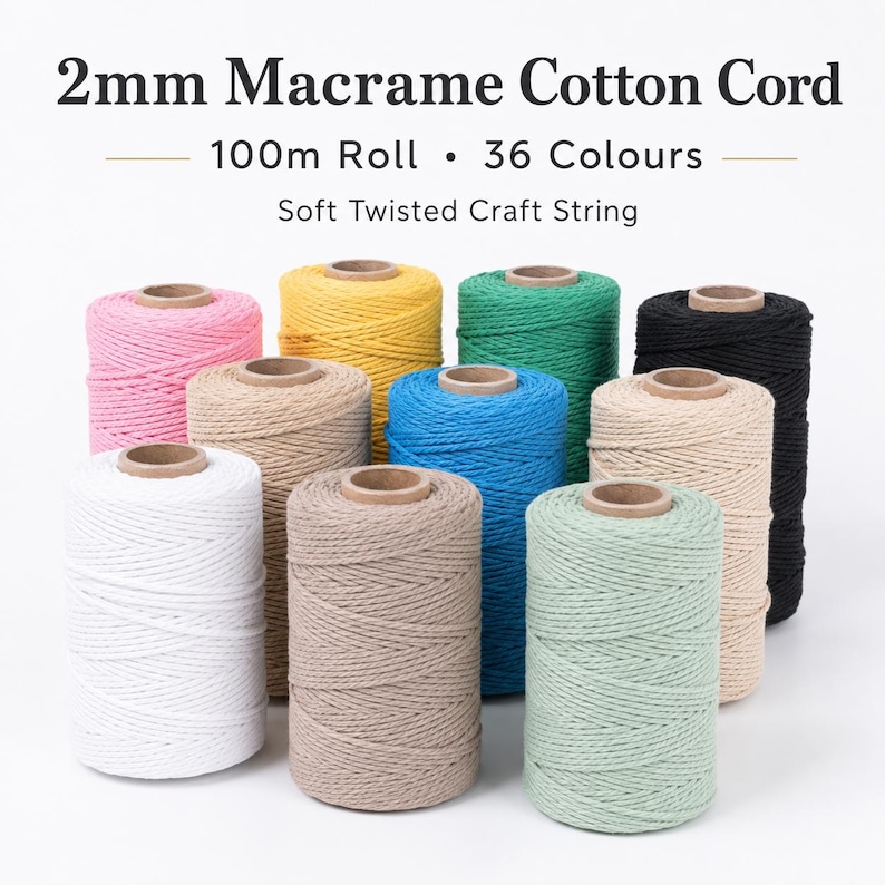 May include: A collection of 2mm macrame cotton cord rolls in various colors including white, pink, yellow, green, black, blue, and beige. The text reads 2mm Macrame Cotton Cord, 100m Roll, 36 Colours, and Soft Twisted Craft String.