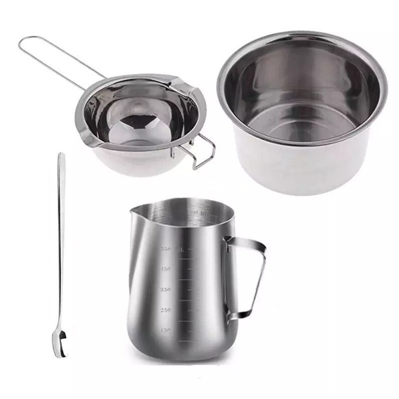 May include: A set of four stainless steel kitchen tools, including a double boiler, a pitcher with measurements in ounces, a small bowl, and a spoon.