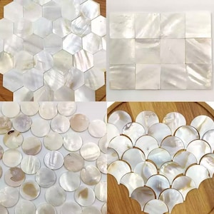 May include: Assortment of white mother of pearl shell tiles in various shapes, including hexagons, squares, circles, and half-circles.