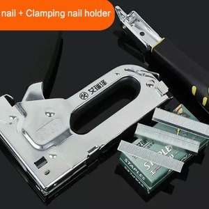 May include: A silver staple gun with a black handle and a clamping nail holder. The image also shows a box of staples and a stack of staples. The text "1000pcs nail + Clamping nail holder" is in the top left corner.