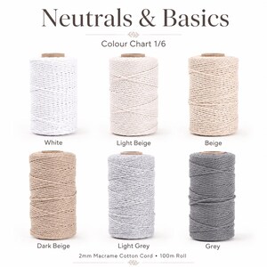 May include: Six spools of 2mm macrame cotton cord in a 100m roll, labeled Neutrals & Basics Colour Chart 1/6. The colors are white, light beige, beige, dark beige, light grey, and grey, arranged in two rows of three spools each on a white background.