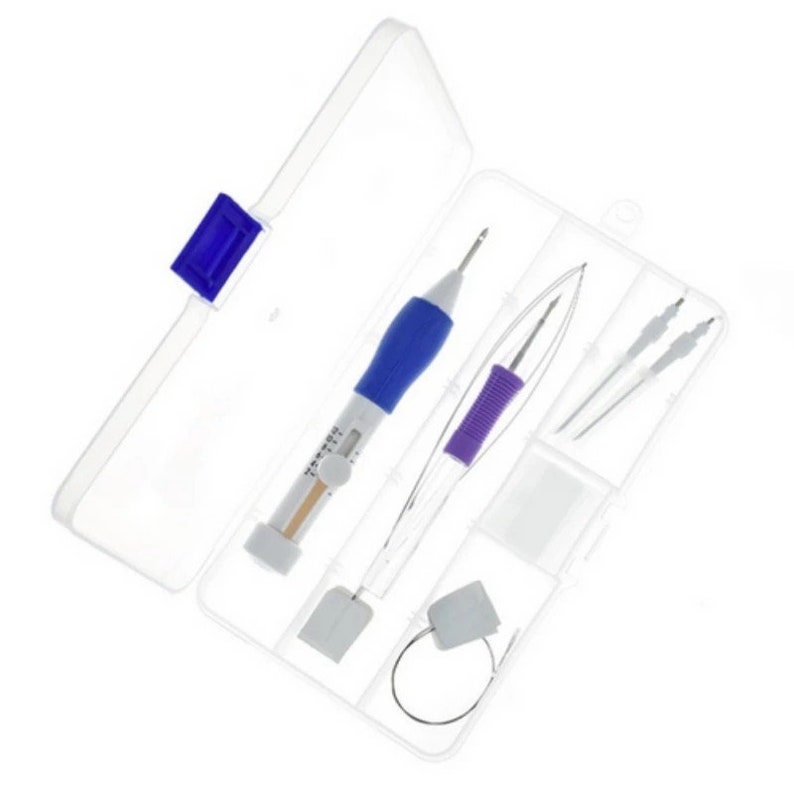 May include: A clear plastic case containing a blue and white punch needle tool, a purple and white punch needle tool, four needles, a small white square, and a small white circle with a loop of wire.