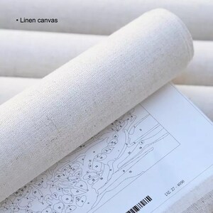 May include: A rolled piece of off-white linen canvas featuring a printed paint-by-number pattern with numbered sections. The text "Linen canvas" is visible in the upper left corner, and the code "DZ 27 - 4050" is printed on the lower right.