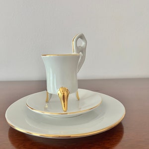 Hermoso juego de café vintage de porcelana blanca y dorada con tres P