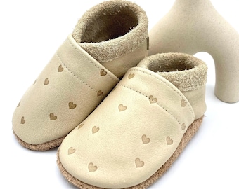 Walnut-colored children's slippers with embossed hearts and lettering  Crawling shoes with embossing Unique children's shoes