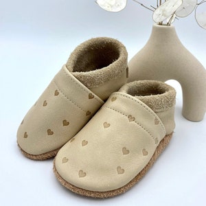 Slippers for children in walnut color with embossed hearts and lettering, crawling shoes with embossing