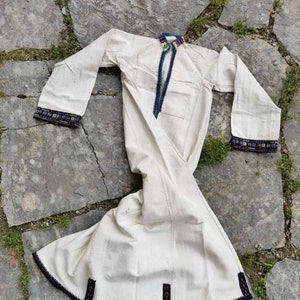 Handmade antique ethnic dress, long shirt, woven and hand embroidered, part of girl's ethic costume from porece region