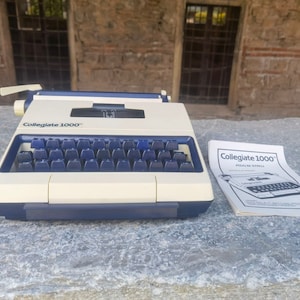Collegiate 1000 vintage portable typewriter, kept in original box never used