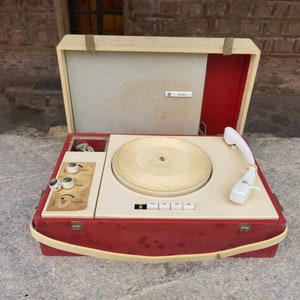 Vintage record player Solo, retro red record player made in Germany